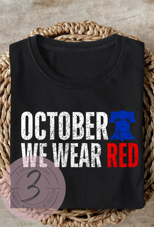 October We Wear Red Bell Distressed Graphic Tee