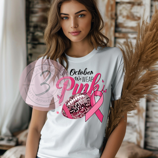 In October we wear pink sparkly football Graphic Tee